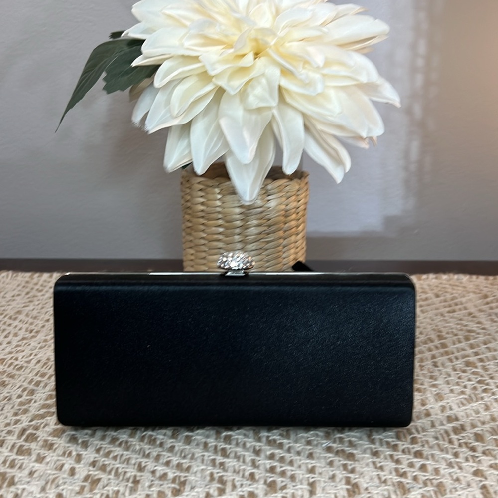 Carolee Satin Clutch 6.75”w x 3”h x 1”d